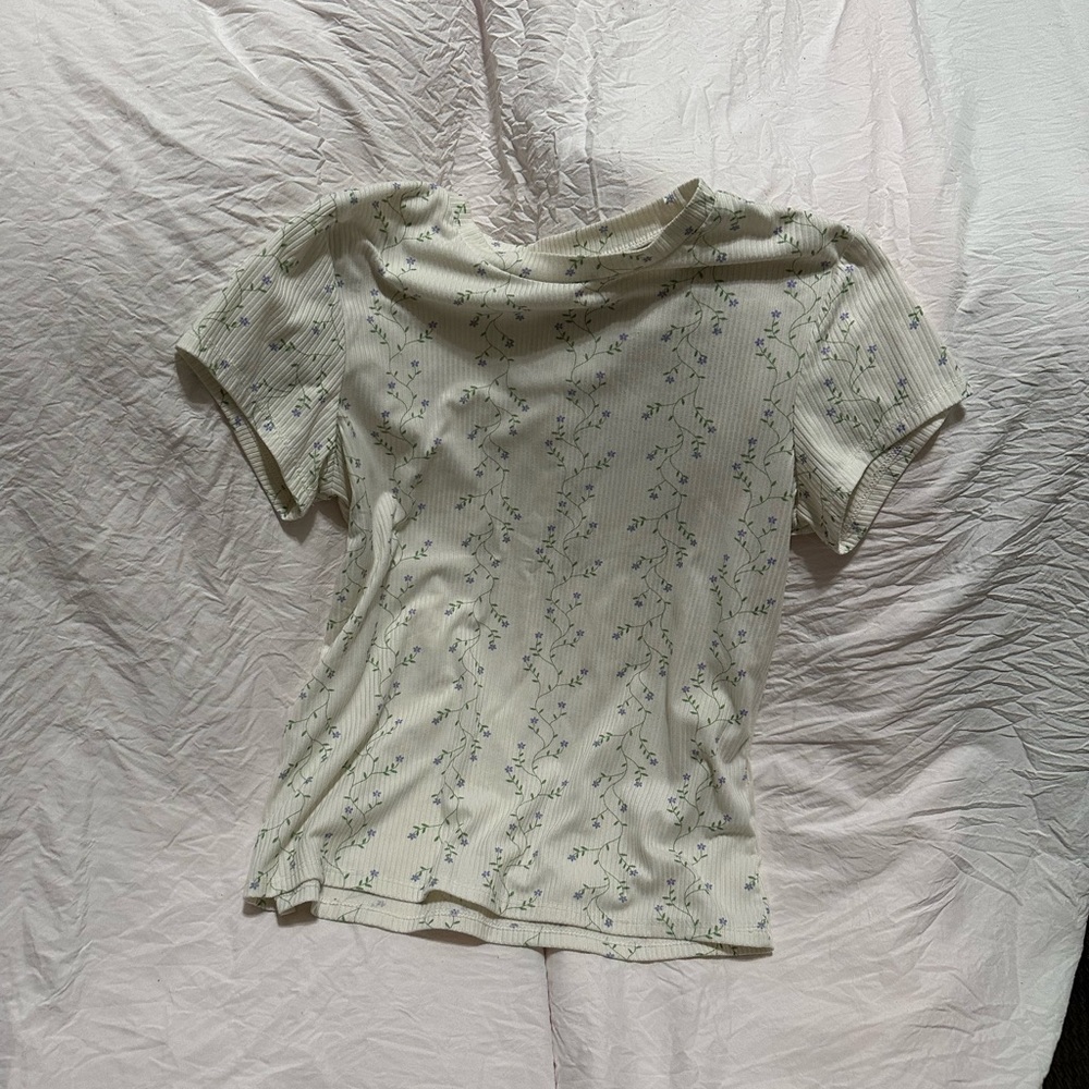 White shirt with green purple flowers and green steams